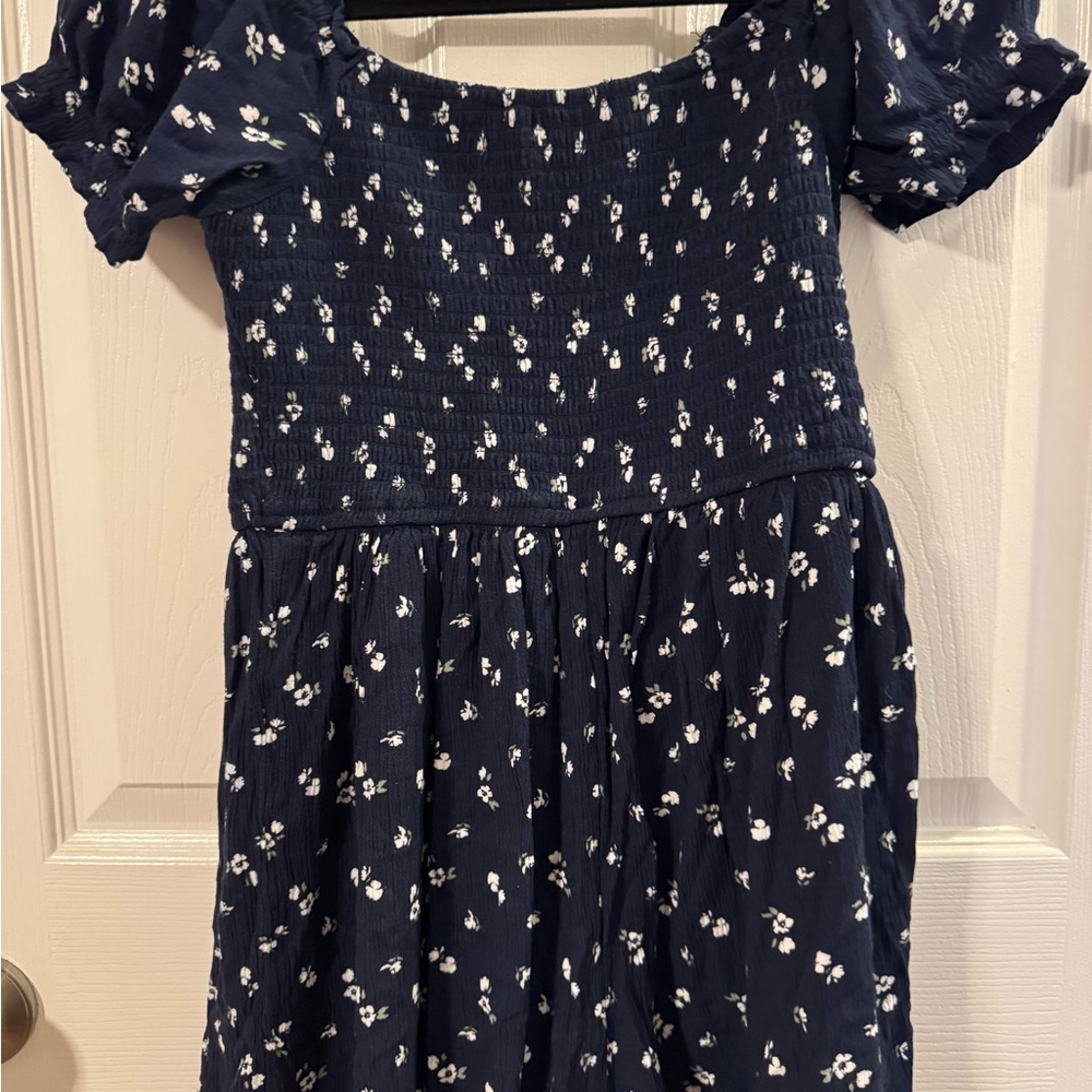 Hollister Navy Romper with White Floral Pattern